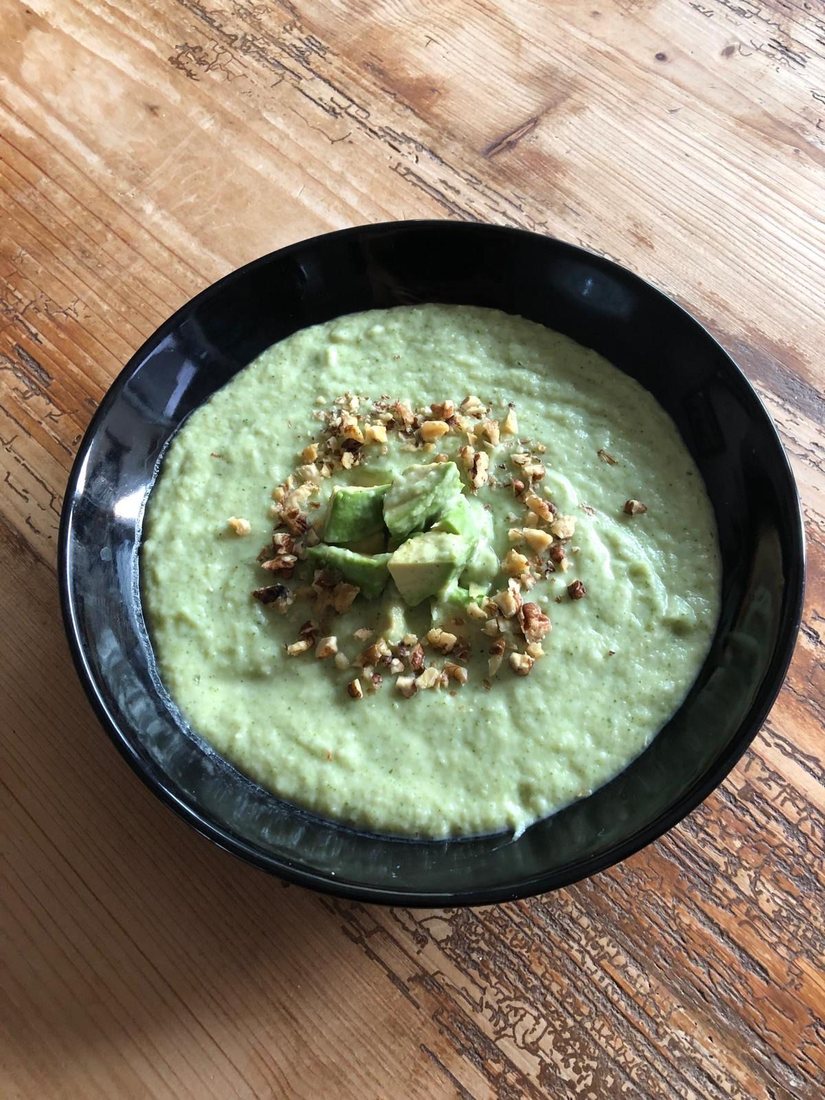 Creamy broccoli and coconut soup with avocado